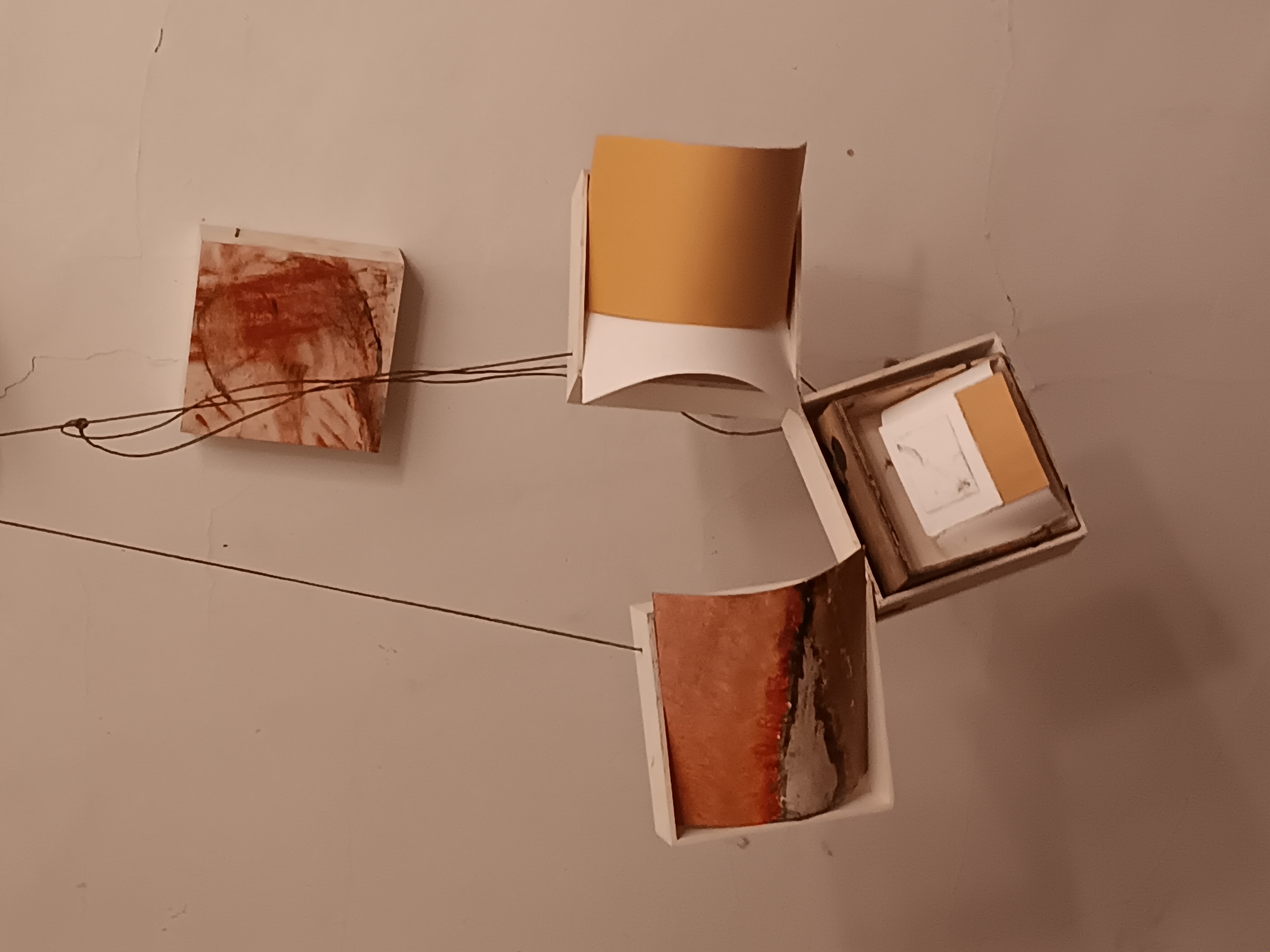 Paper, wood and twine