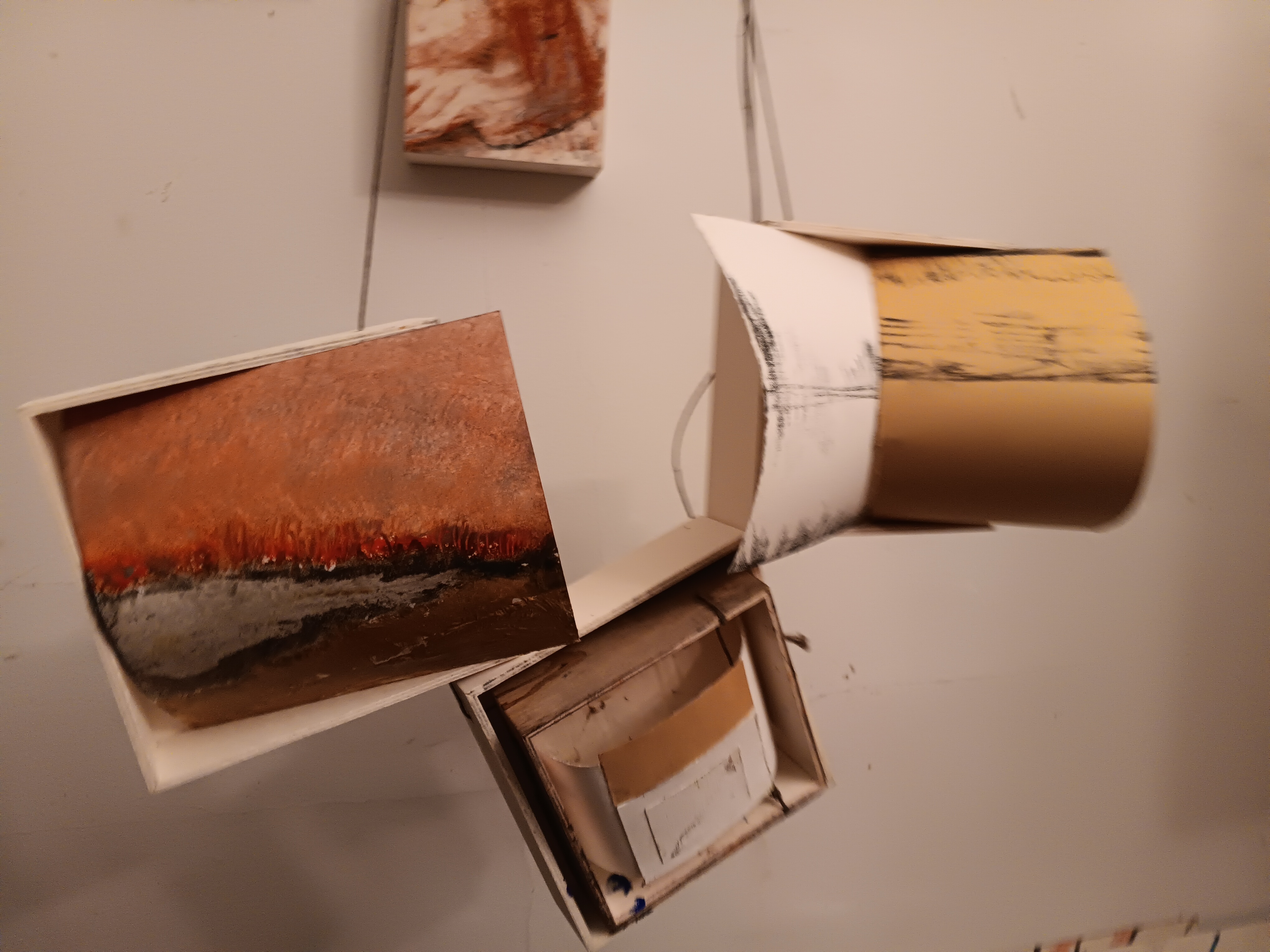 Paper, wood and twine
